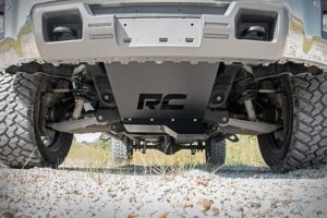 aftermarket skid plate installed underneath an off-road vehicle for underbody protection installed at american off road customs in las vegas